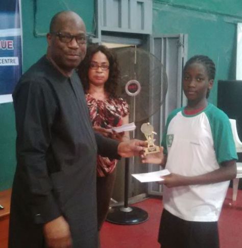 NTTF President, Wahid Oshodi with winner of the day in the girls event, Sukurat Aiyelabegan at the U-16 league in Lagos